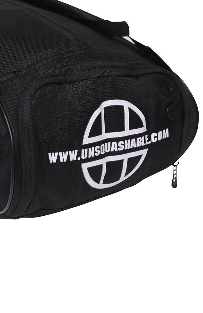 UNSQUASHABLE TOUR-TEC PRO Deluxe Schlägertasche schwarz und weiss Schuhfach mit zwei Lüftungen und Logo